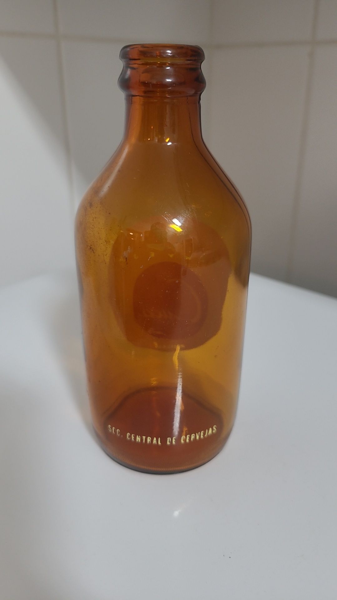 Garrafa pirogravada da antiga cerveja Angolana CUCA