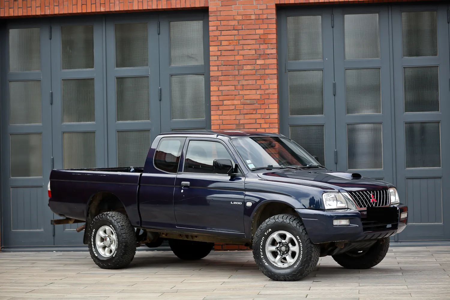 Mitsubishi L200 2.5D 133PS 4x4 KLIMA REDUKTOR bezwypadek alu hak serwis 1właść Francja