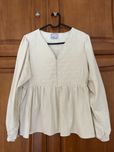 Blusa branca manga abalonada