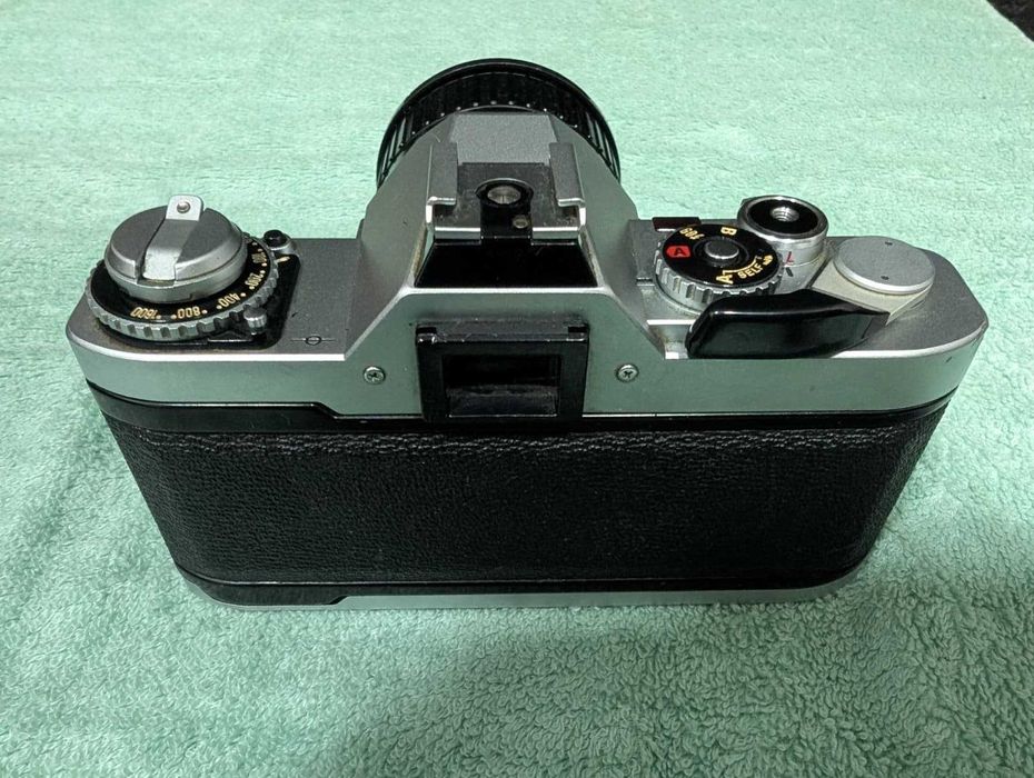 Canon AV-1 + Lente FD + Teleconversor + Filtro UV + Bolsa