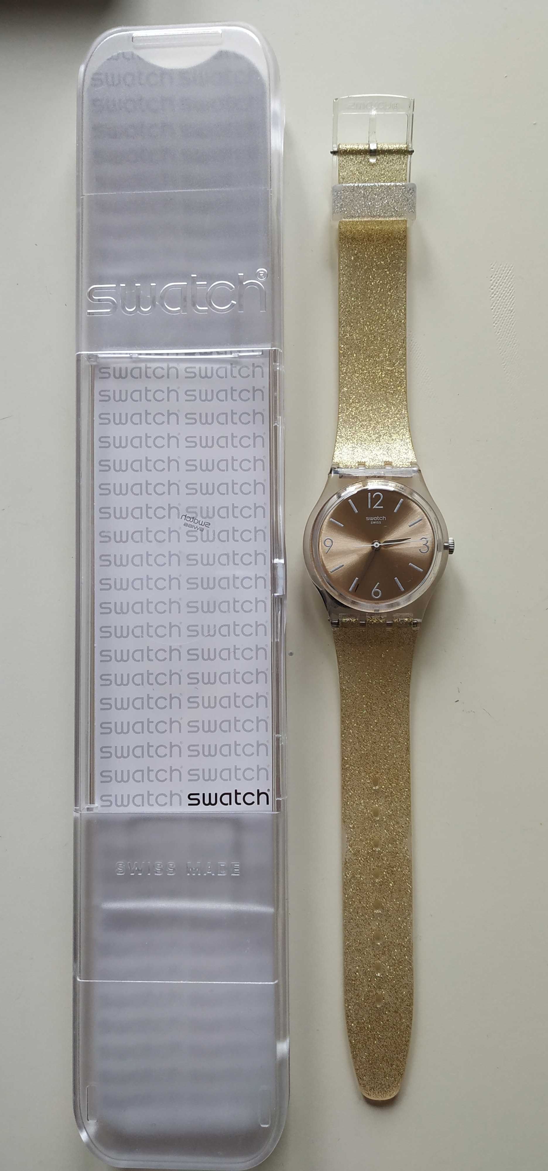 Relógio Swatch bracelete dourada e brilhantes