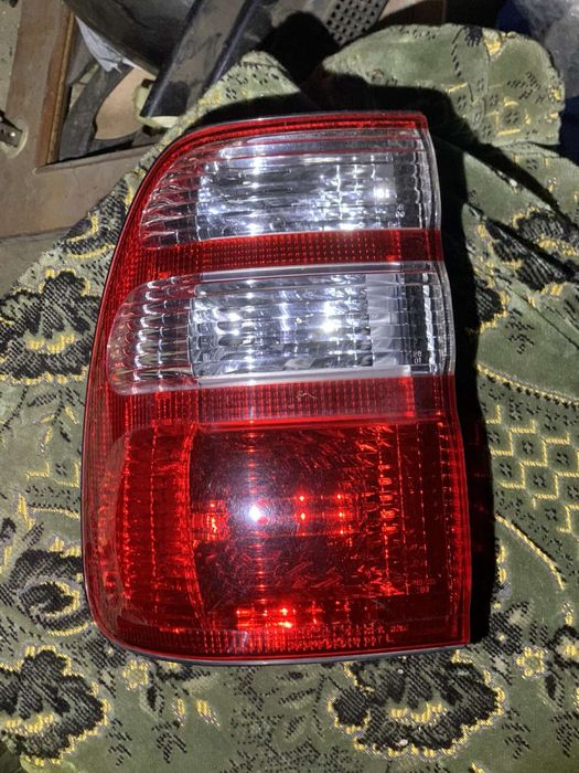 Задні фонарі стопи land cruiser 100