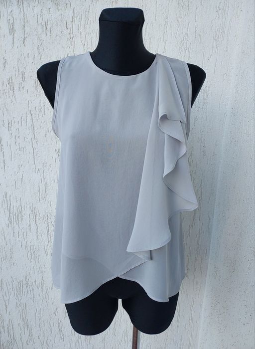 Bluzeczka z falbaną w roz S/M.