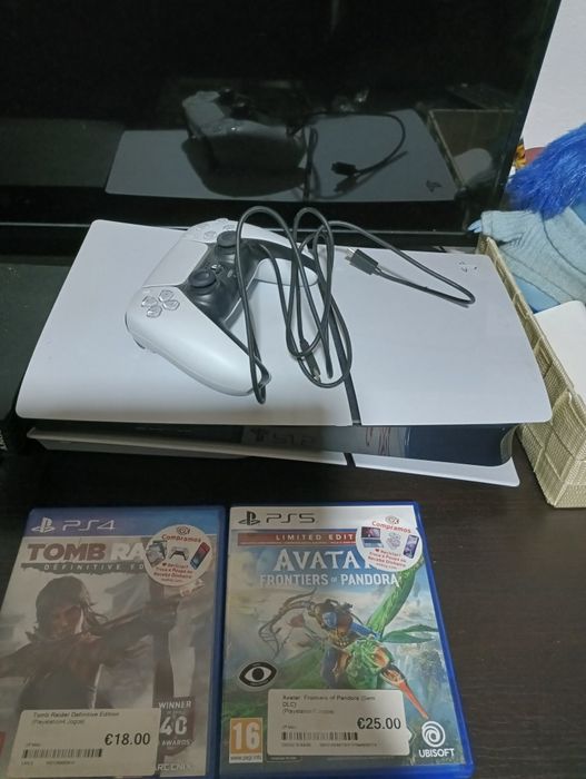 Ps5 com caixa e 4 jogos