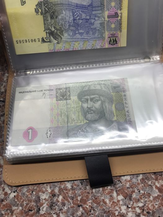 Альбом для банкнот на 50 аркушів.