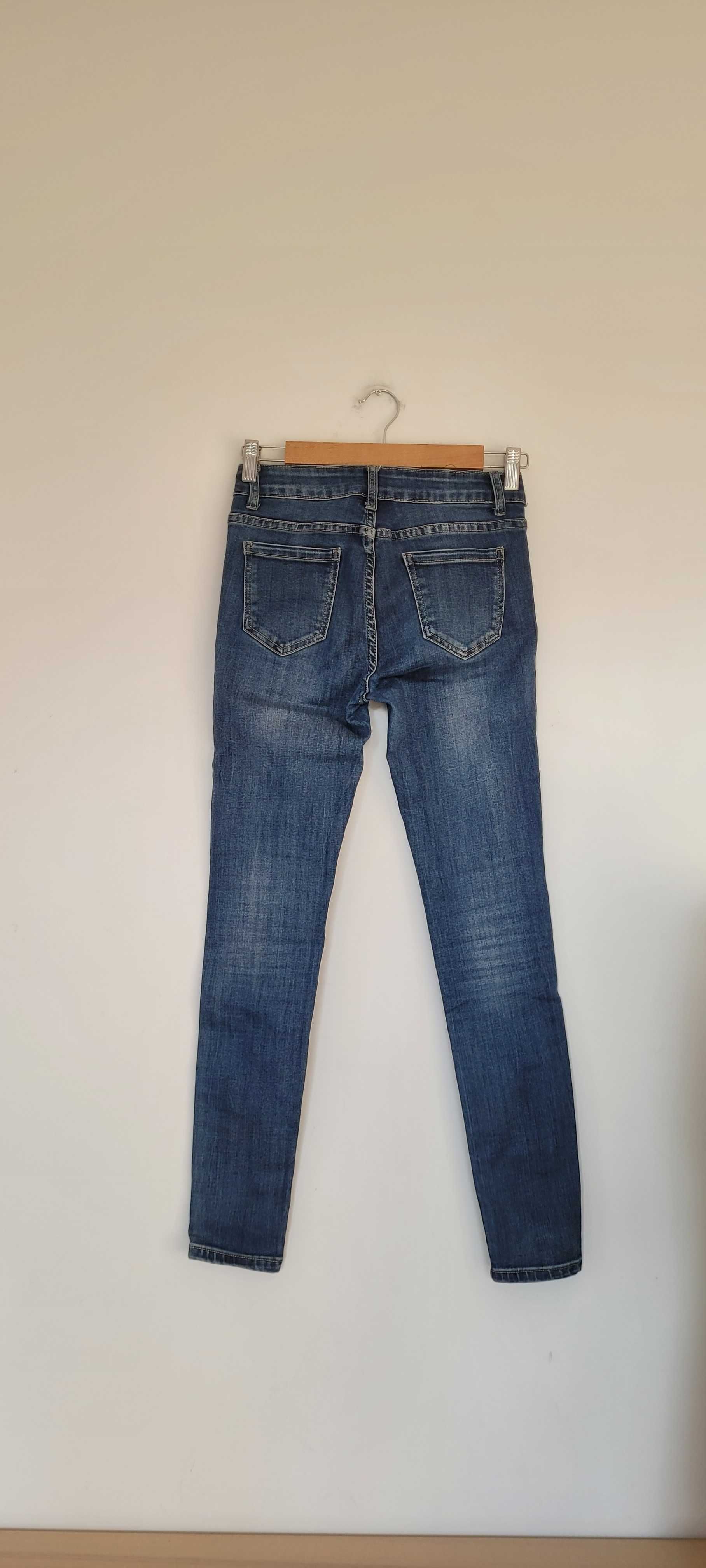 Niebieskie spodnie jeans perełki przetarcia Redial,roz38