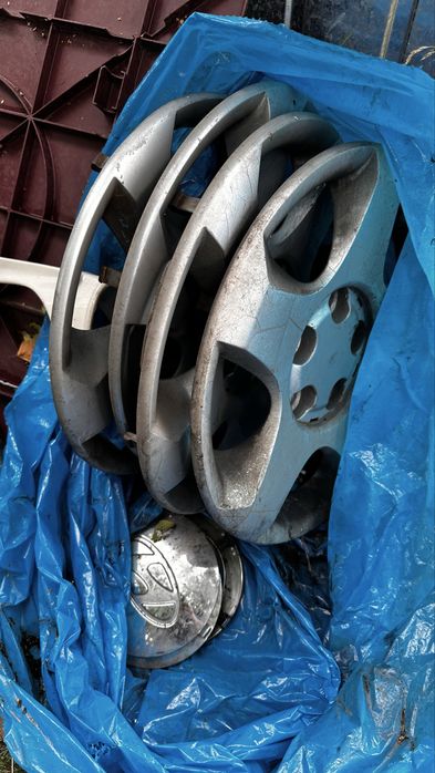 Felgi + kołpaki + stare opony Hyundia Santa Fe l