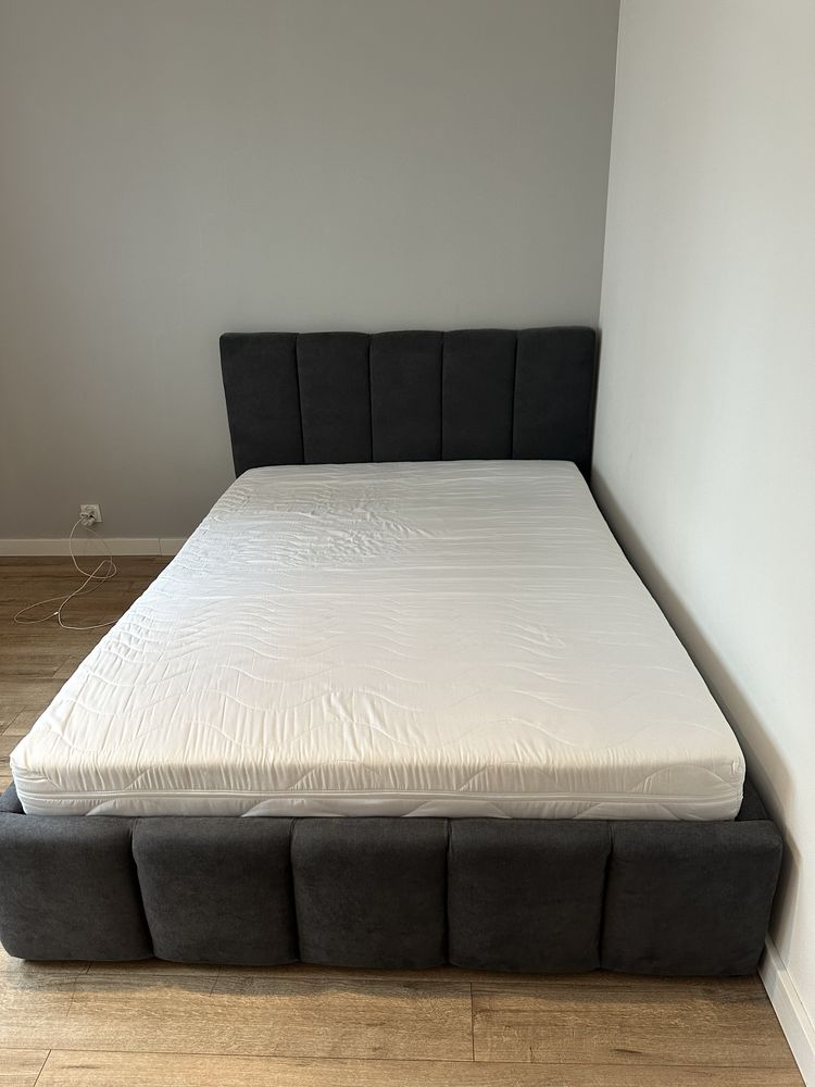 Łóżko tapicerowane z materacem 140