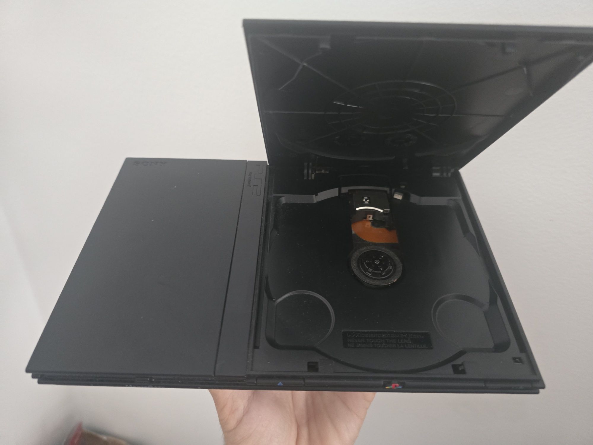 Playstation 2 slim (ps2) + comando + eyetoy + jogos