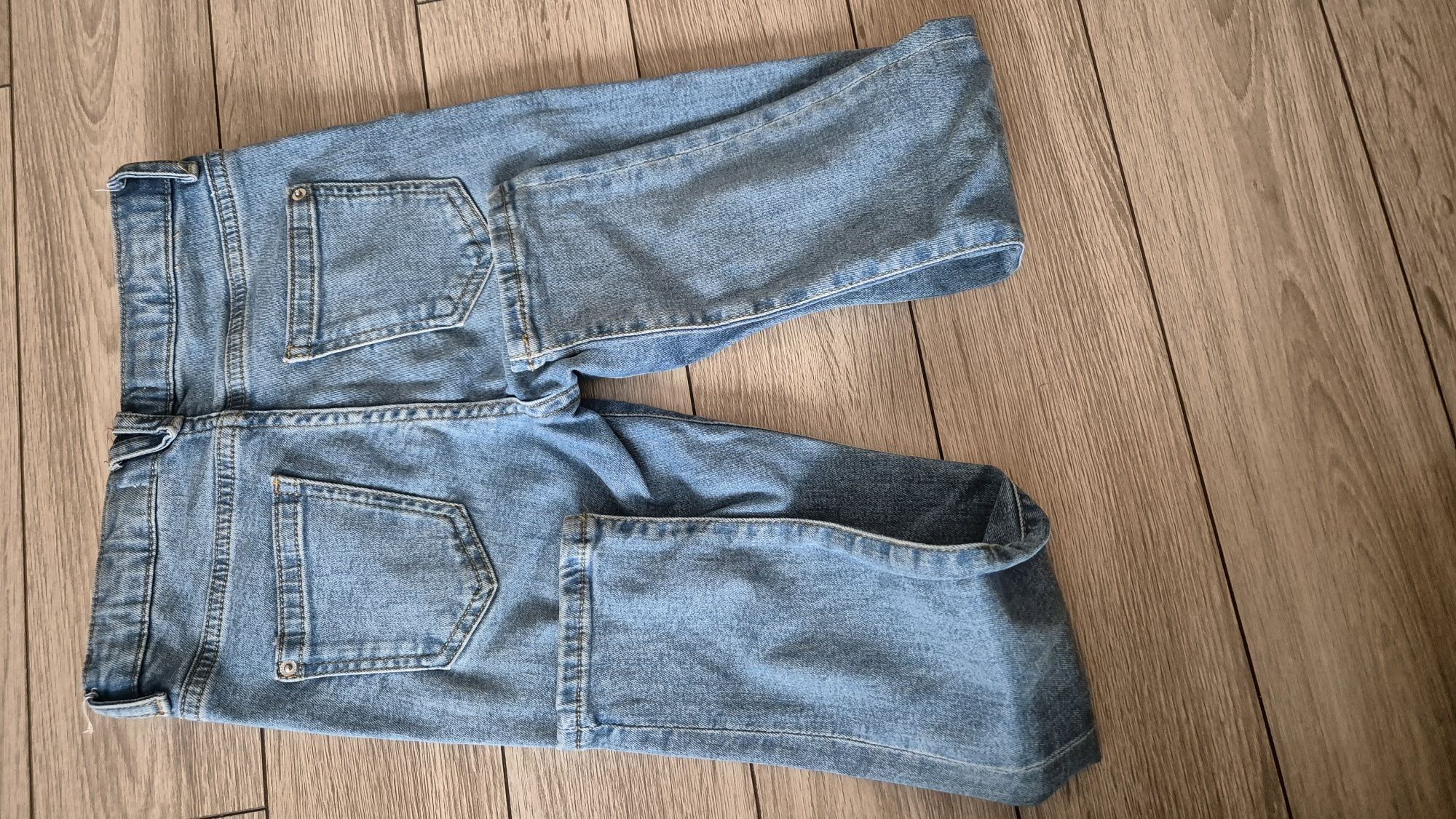 2x spodnie reserved jeans dodatkowo leginsy w prazki rozm 128