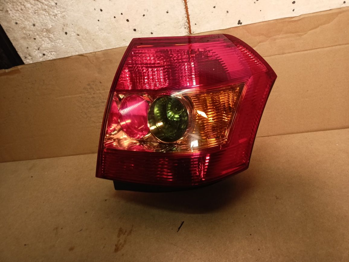 Lampa lewy tył lewa tylna toyota corolla e12 HB lift FL 04-07