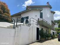 Moradia T6 com Vista Serra, Jardim e Garagem Dupla no Coração de Argan