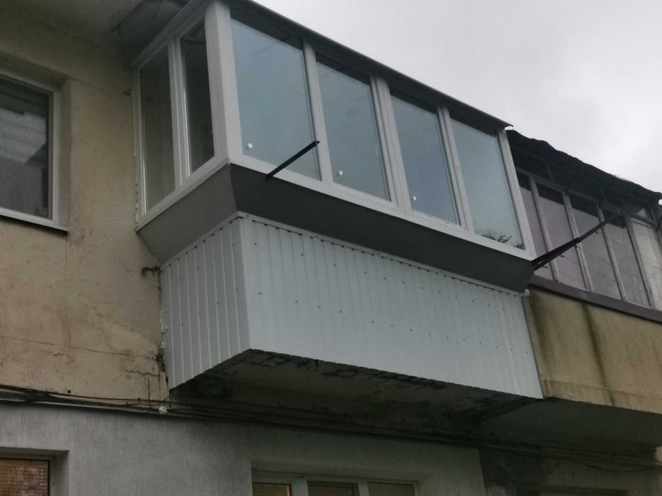 балкони,вікна,двері