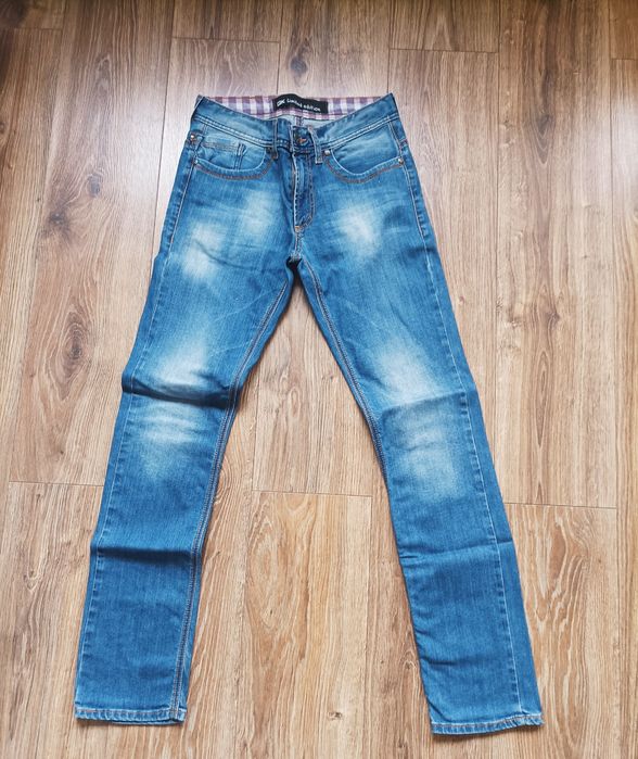 Spodnie jeansowe grawik 30/32