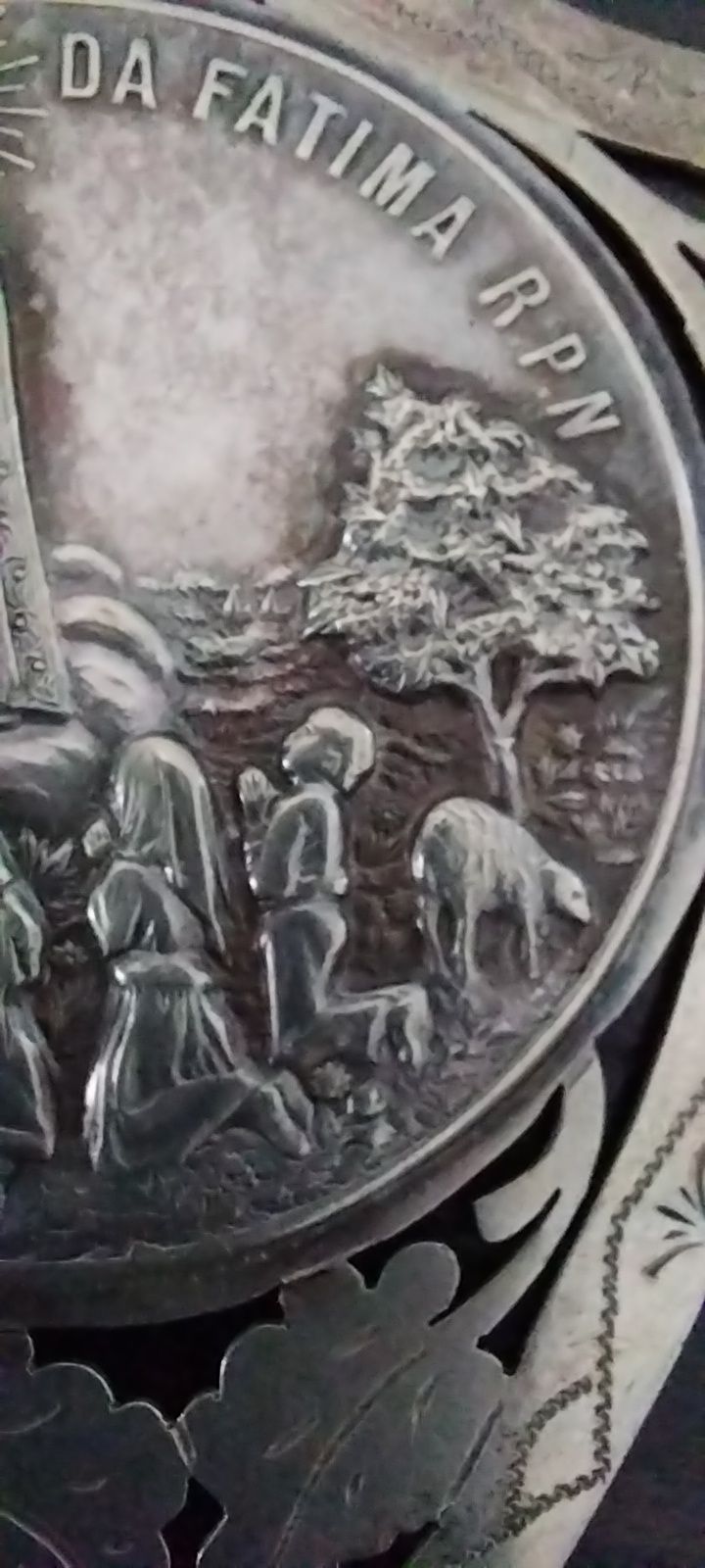 Medalha antiga em prata