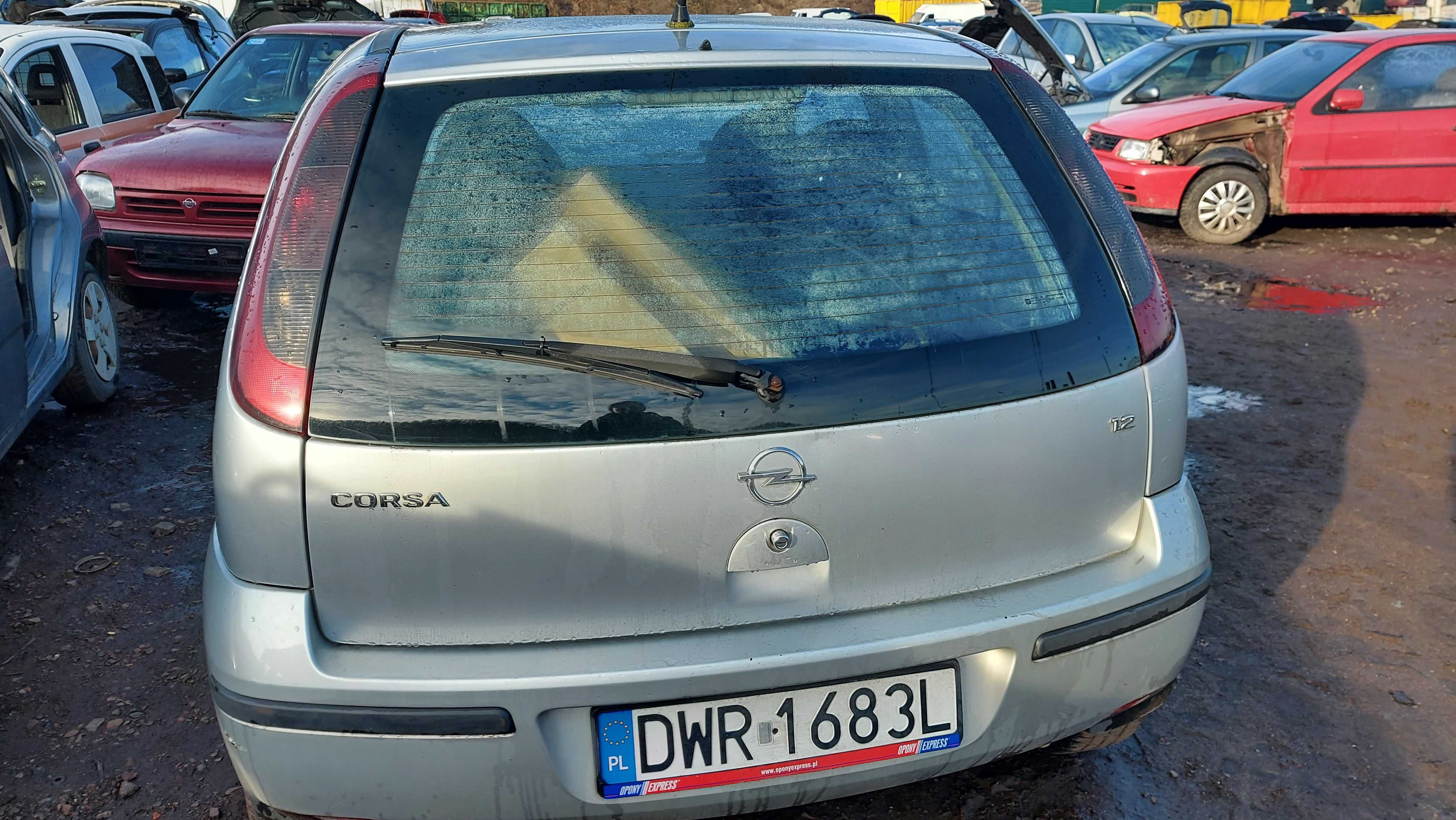 Opel Corsa C maska przednia srebrna Z157 FV części/dostawa