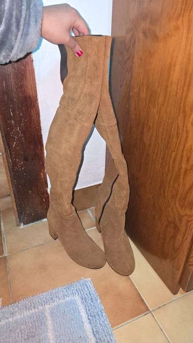 Botas cano alto castanhas