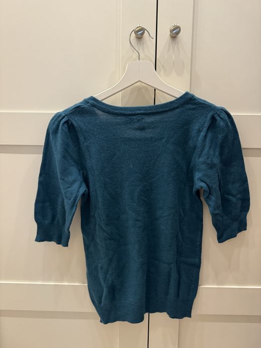 Camisola de malha azul com brilhantes