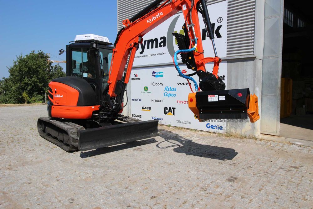 Máquinas  Giratórias de rastos, Minicarregadeiras