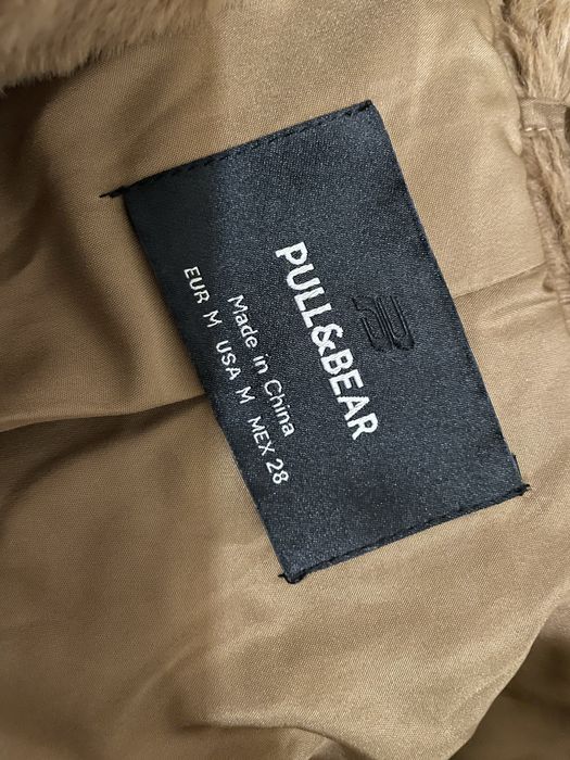 Casaco castanho pelo