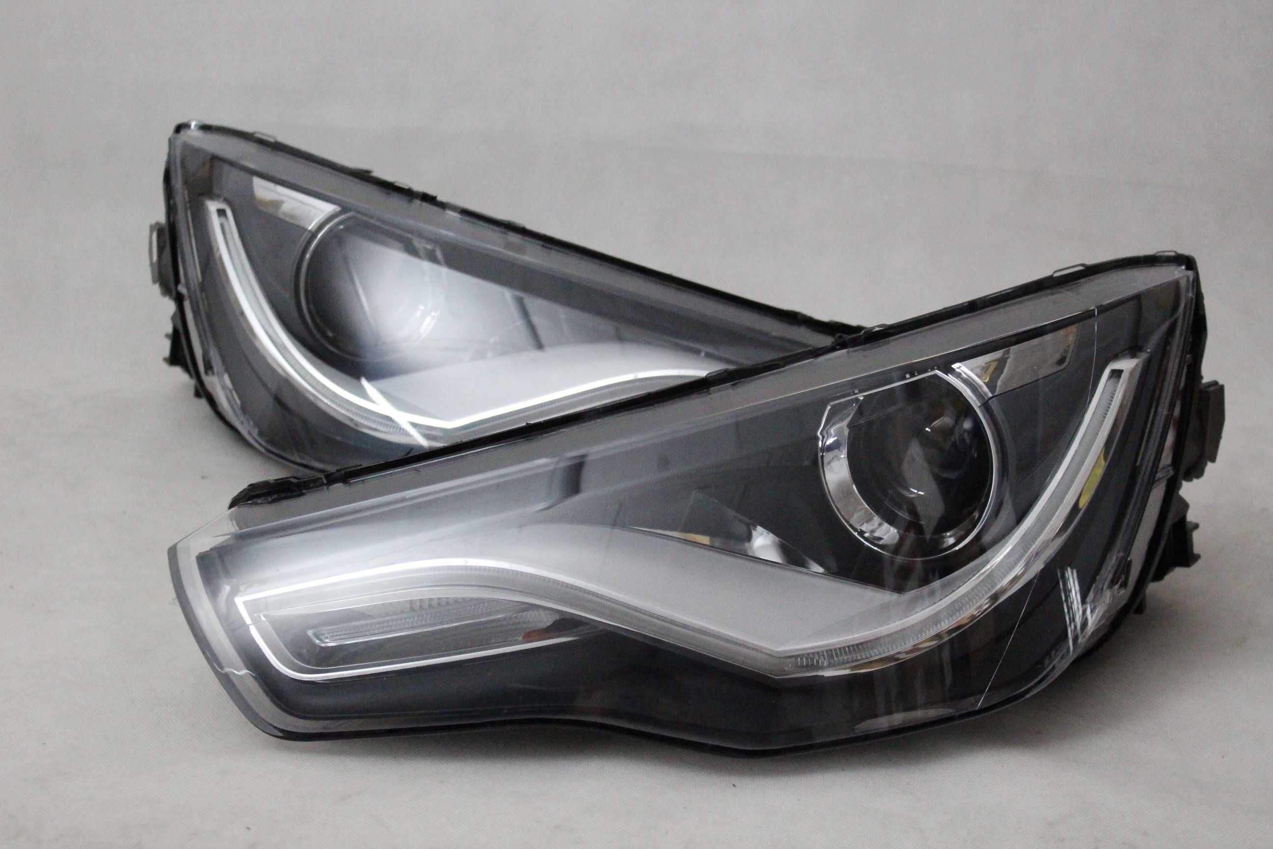 Lampy przednie przód AUDI A1 10-14 H7 soczewka xenon look LED BAR NEON