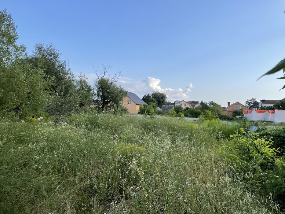 Земля на Подільській