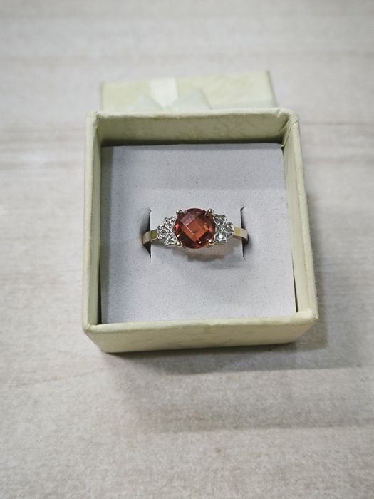 Złoty pierścionek pomarańczowe oczko pr585