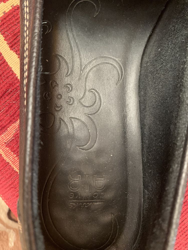 Шкуряні туфлі-мокасини Clarks