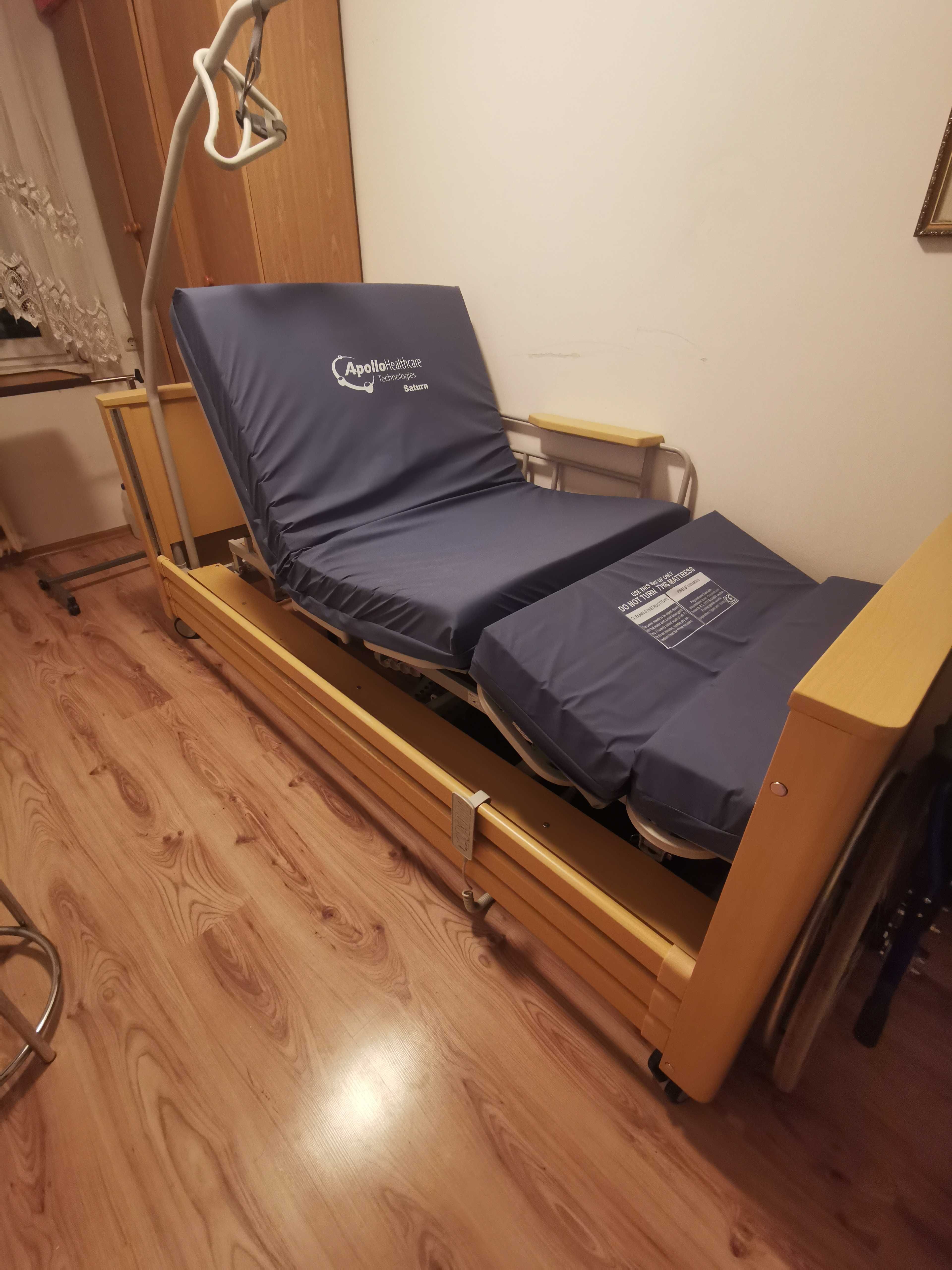 Łóżko rehabilitacyjne APOLLO Saturn z funkcją pionizacji i fotela.