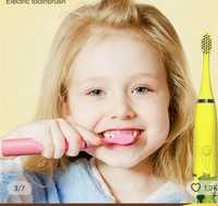 Пульсуюча дитяча зубна щітка.