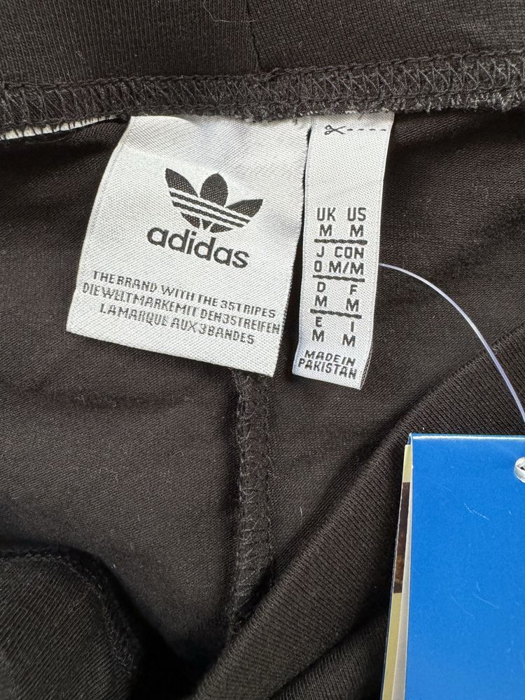 Бавовняні тонкі чорні лосіни з лого adidas
