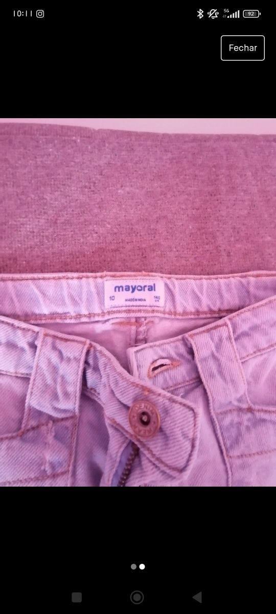Calça ganga com rasgos