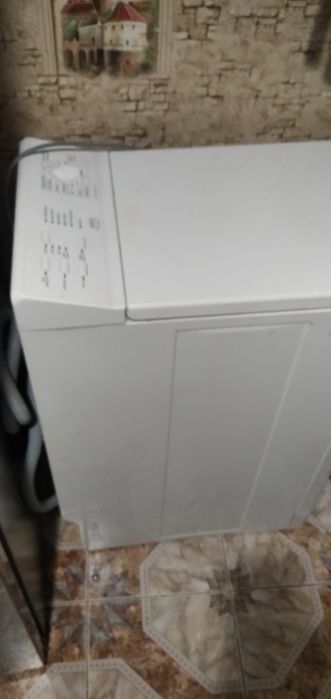 Вертикальна пральна машина