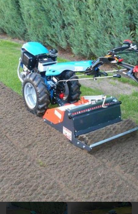 Usługi ogrodnicze wertykulacja glebogryzarka sianie trawy itp