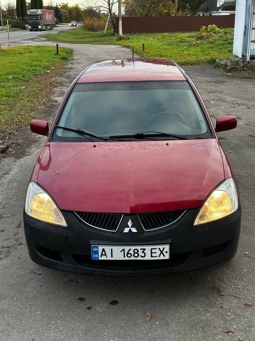 Mitsubishi Lancer 9 2006 (1.6газ/бенз)