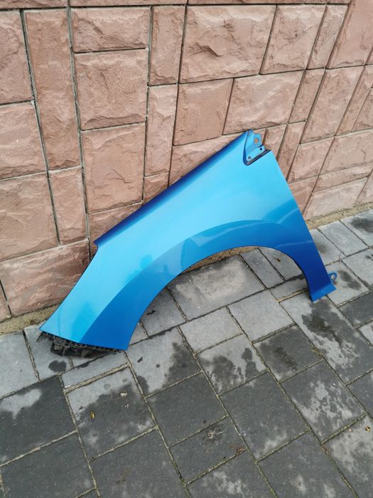 Błotnik lewy przód przedni Peugeot 308 kod kmfd rok09