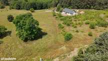 Działka pod lasem(enklawa ciszy i spokoju) 1440m2 prąd,woda,światłowód