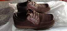 Diversos sapatos e ténis de marca