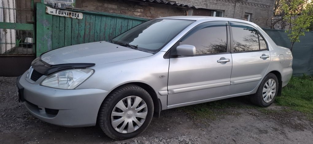 Разборка Mitsubishi Lancer  9