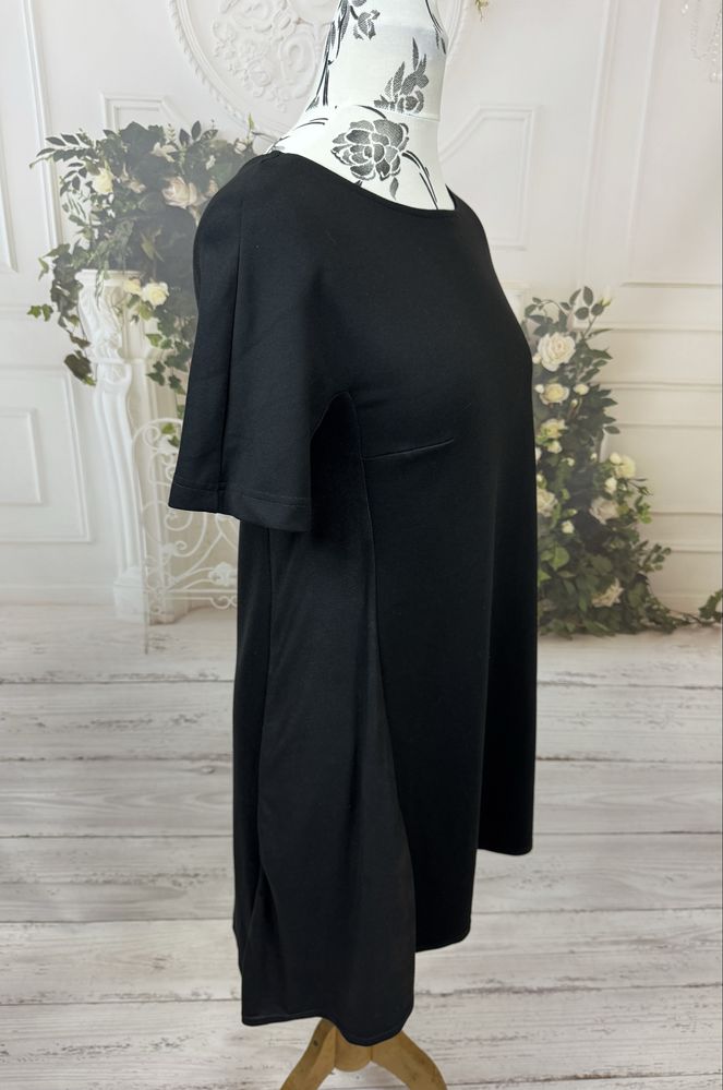 Elegancka czarna sukienka Orsay – klasyka i styl 40 L wstawki z boku