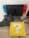 Nintendo Switch v2 + 19 gier + Pro Controller + Stojak + Karta Pamięci