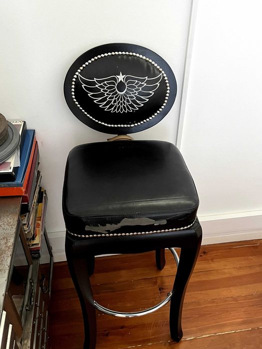 Cadeira alta de pele