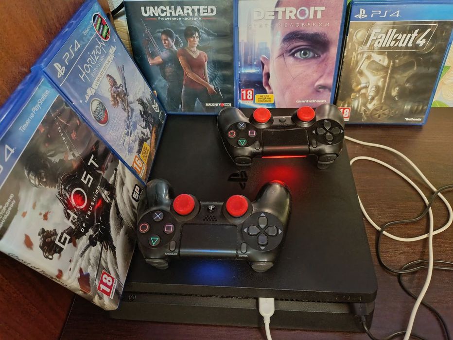 PS4 slim 500gb.consol.2.gamepad.5 games