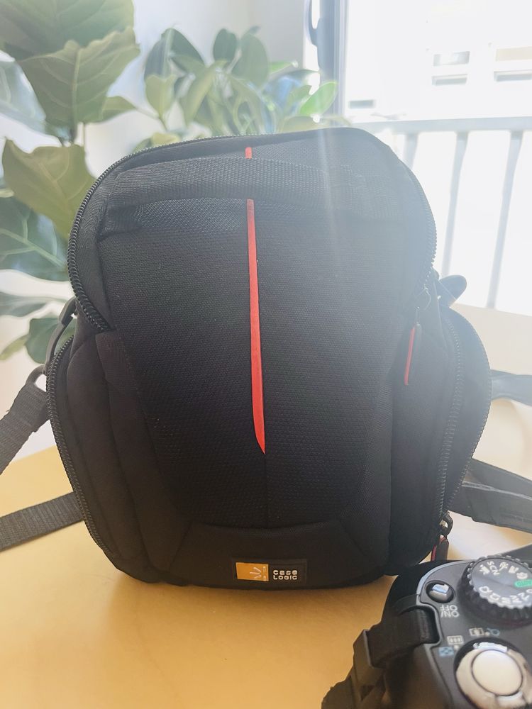 Canon PowerShot SX30 IS with a camera bag