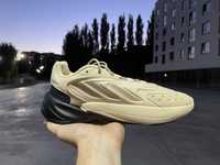Adidas Ozelia shoes Strata / Magic beige / Core black