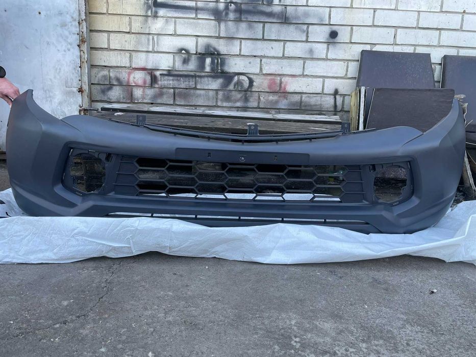 Бампер передний l200 - 2015 - 2018 новый аналог 6400F769  6400G511