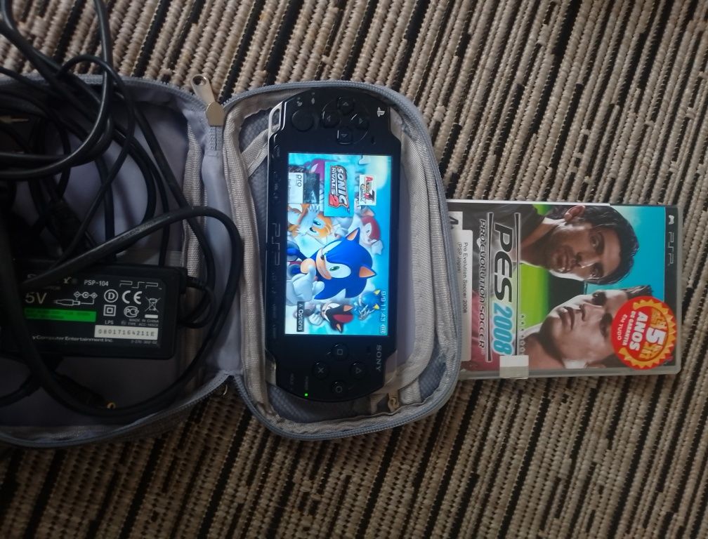 PSP com jogos e bolso
