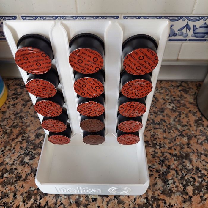 Porta capsulas delta