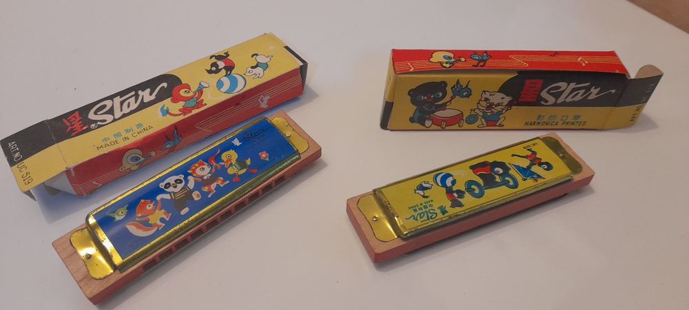 Brinquedo lote 2 harmonicas com caixa