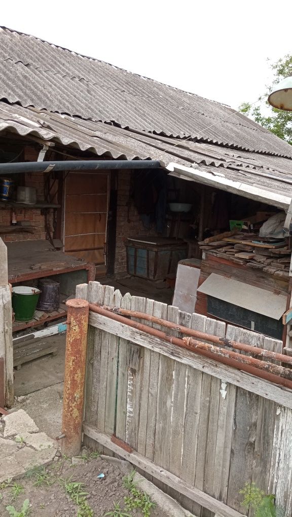 Продам  1/2 будинку.(Вулиця М. Грушевського. Стара назва Чекістів)